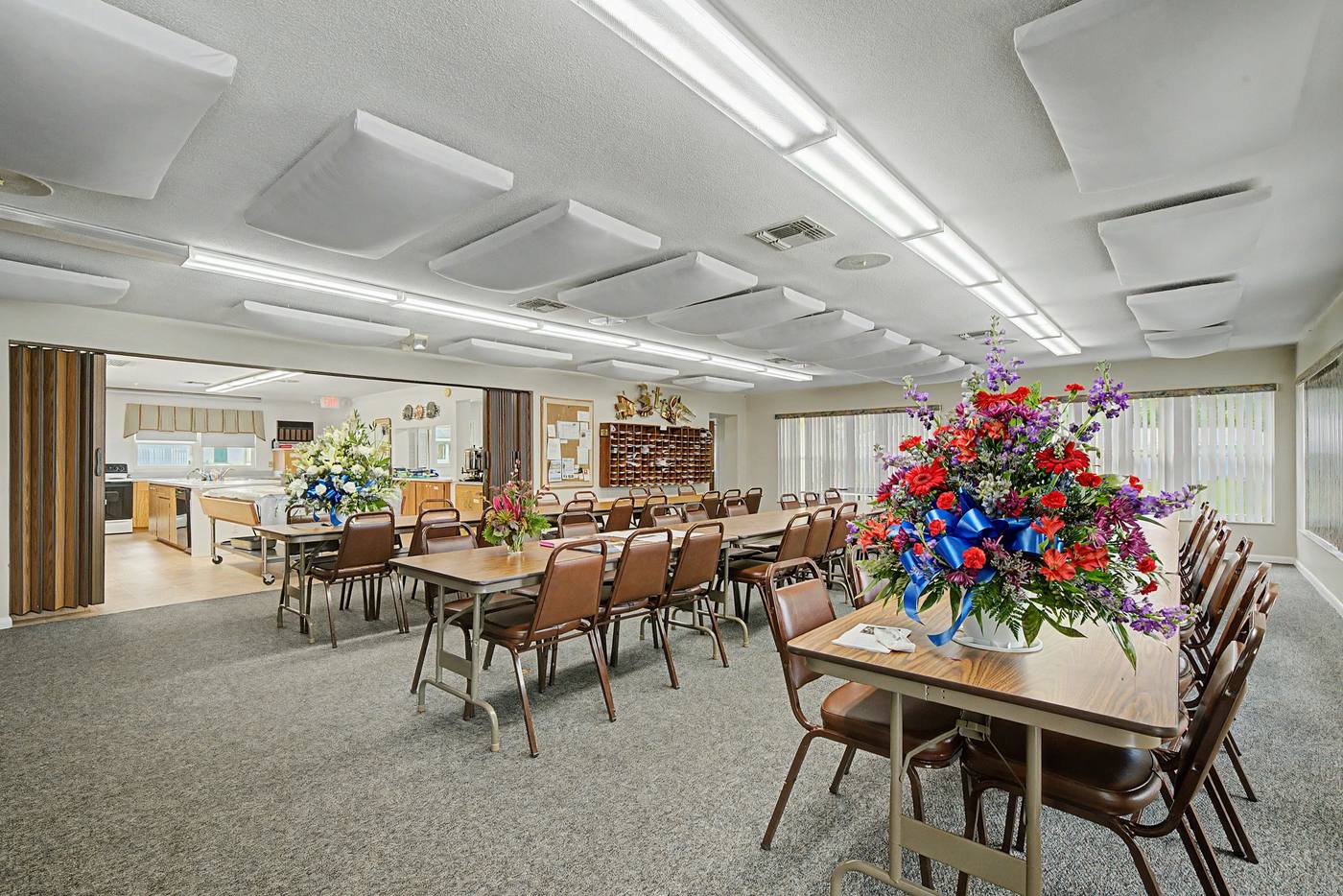 The dining room set with tables and flowers