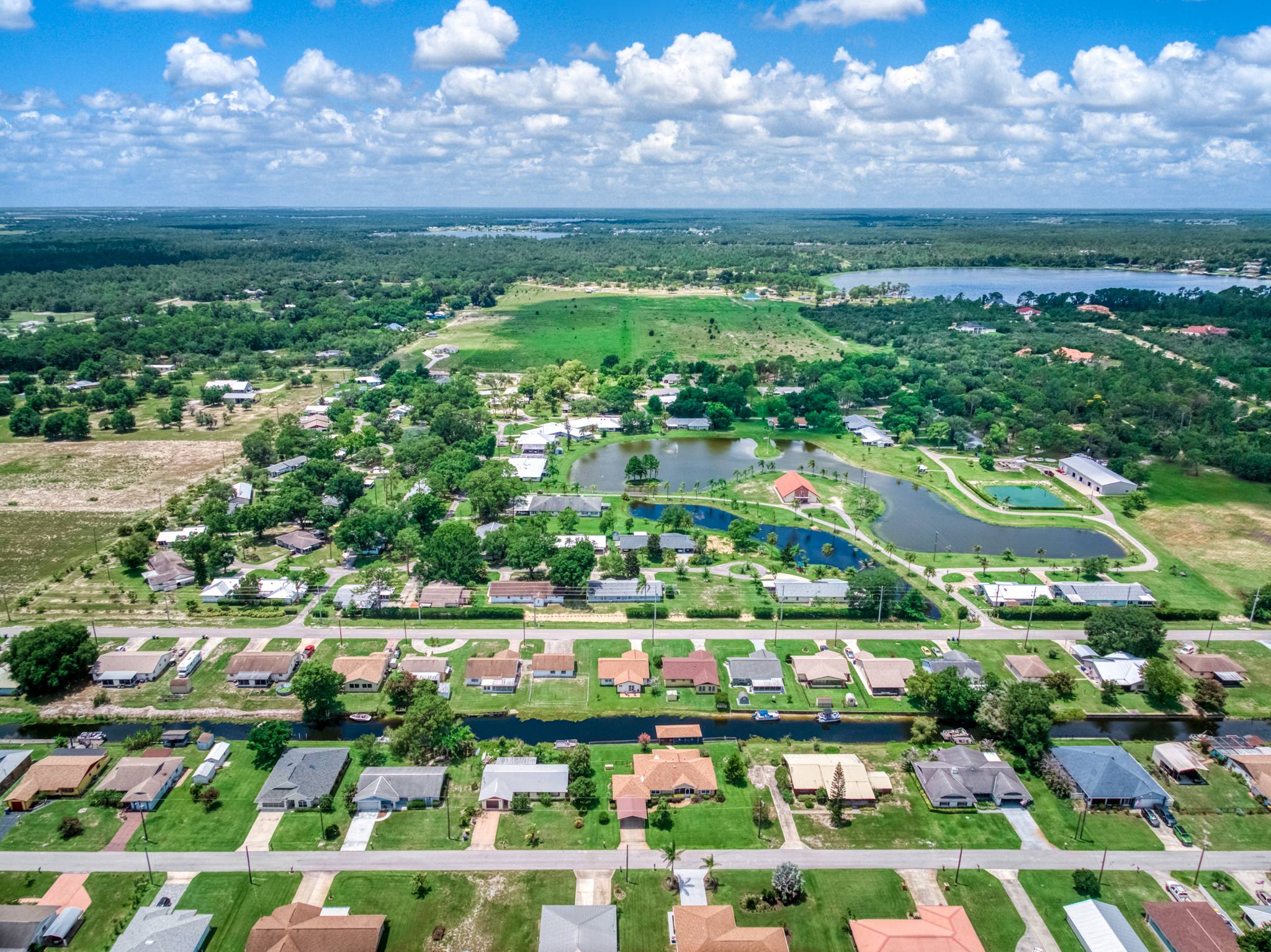 The entire campus seen from high above, with the lake in the center and the surrounding neighborhood